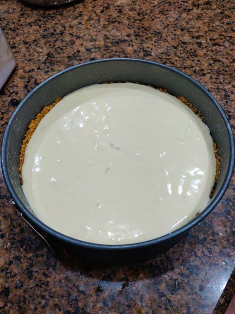 Cheesecake ready to bake in pan