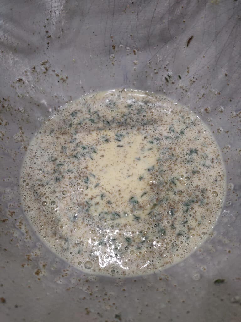 Egg ans pice mixture in a bowl for meatloaf