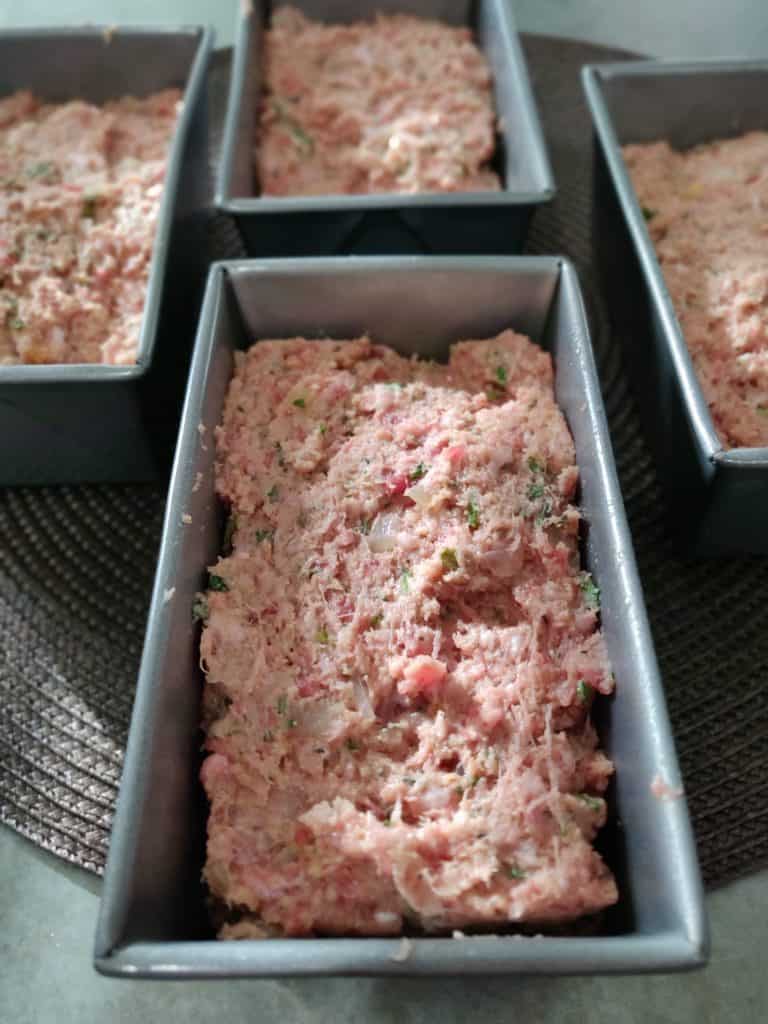 meatloaf in small baking pans ready to bake