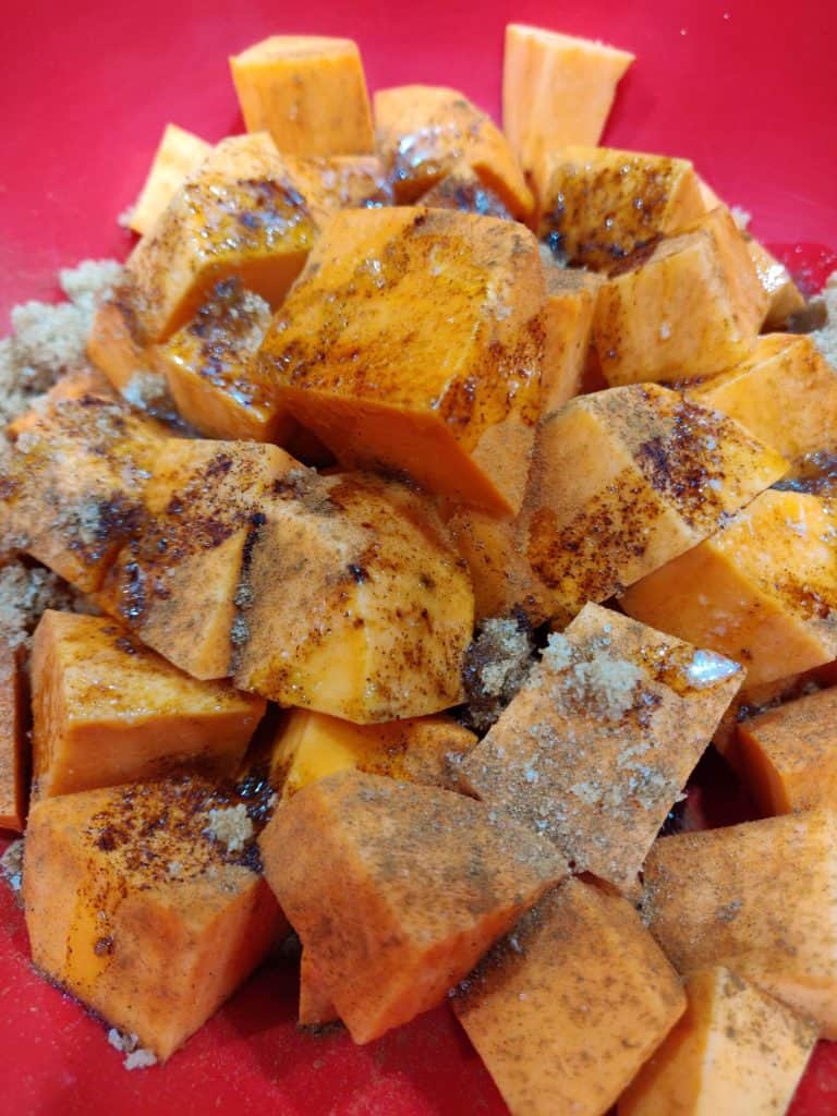 Sweet potatoes covered in spices