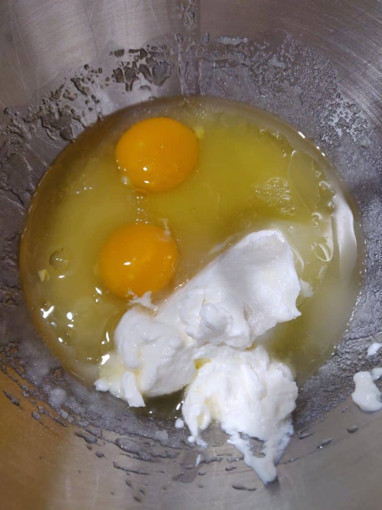 eggs, sour cream in bowl