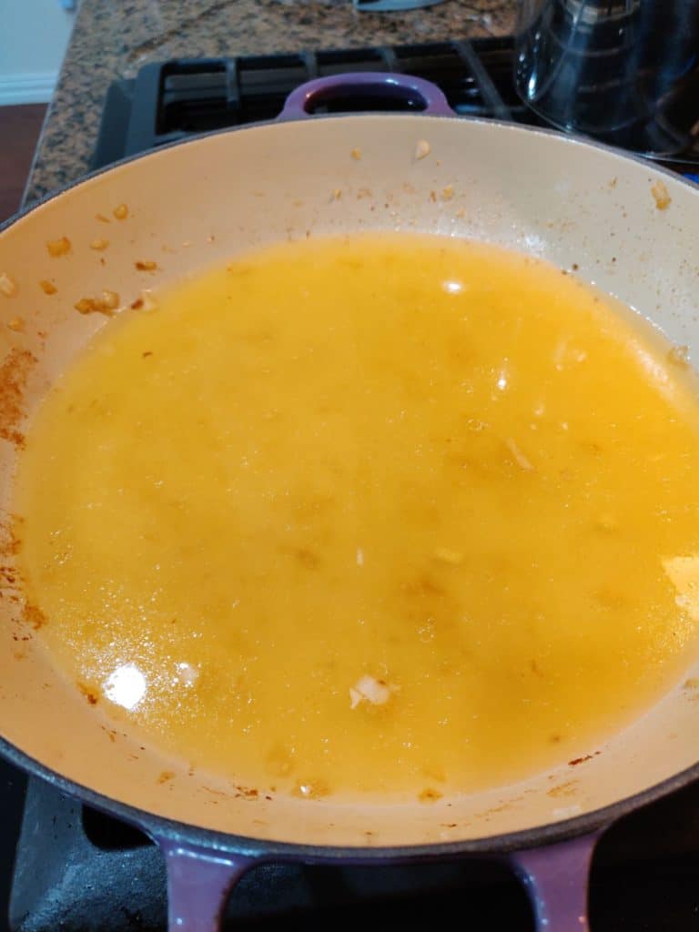 chicken stock in pan