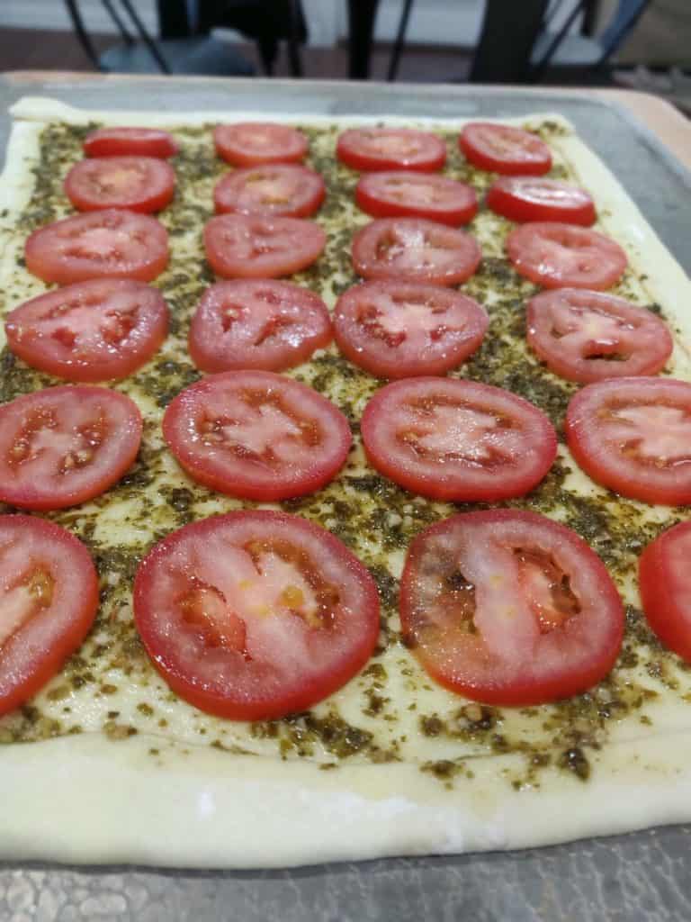Tomatoes on pastry dough