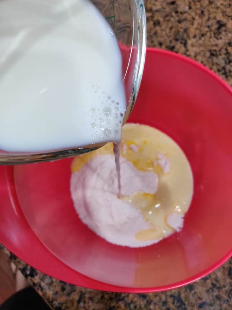 Adding milk to pudding powder
