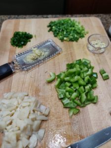 chopped veggies on cutting board