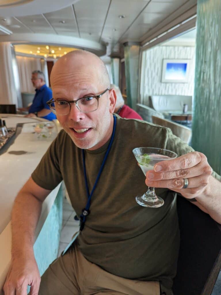 John holding his martini glass
