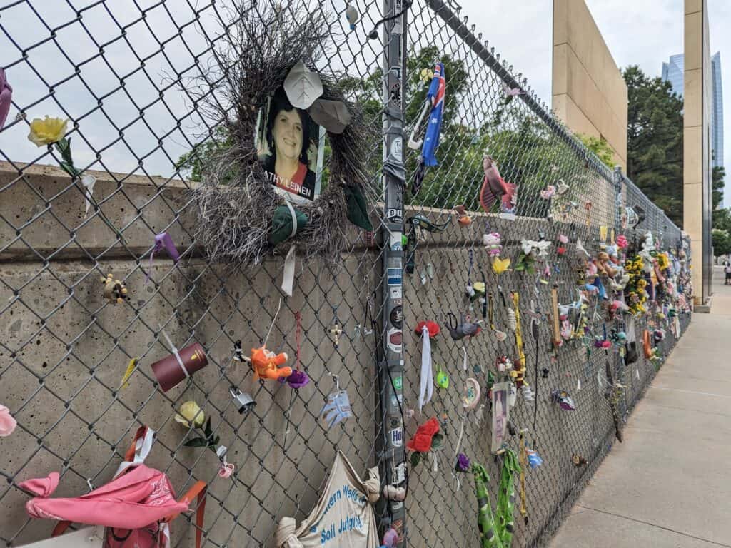 OKC memorial of metal fence with memorabilia 