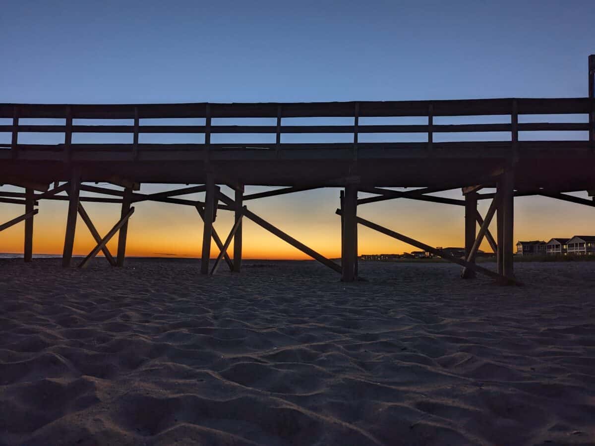 View of sunset with the Holden Beach Pier in the foreground