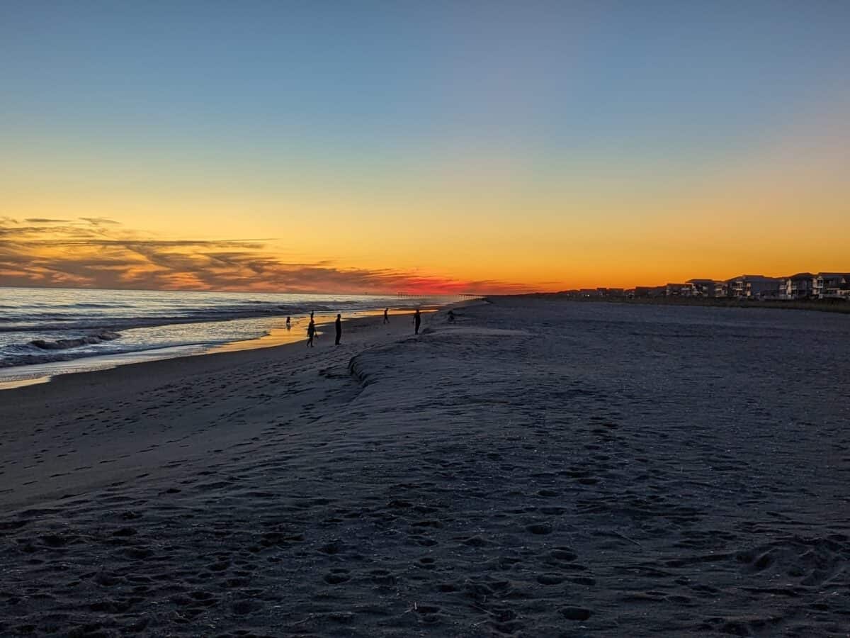 Standing on Holden Beach looking at the sunset