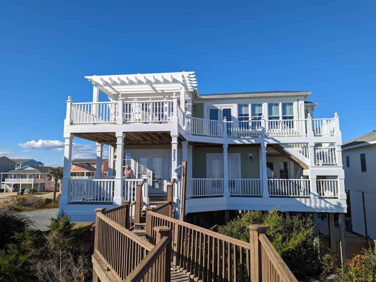 Back view of three story house on Holden Beach